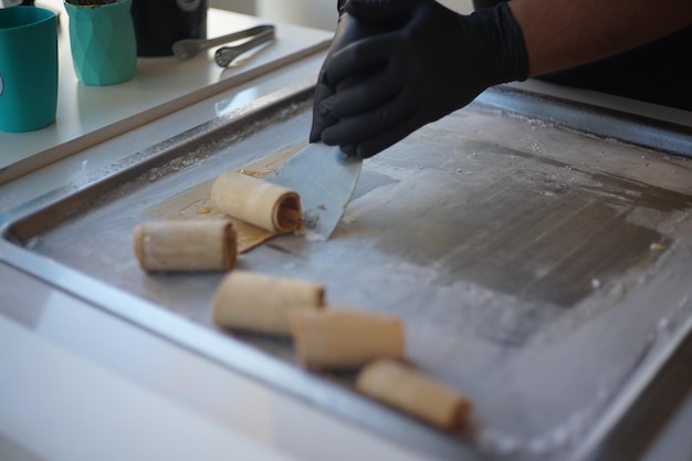 midsection of person preparing food on cutting board