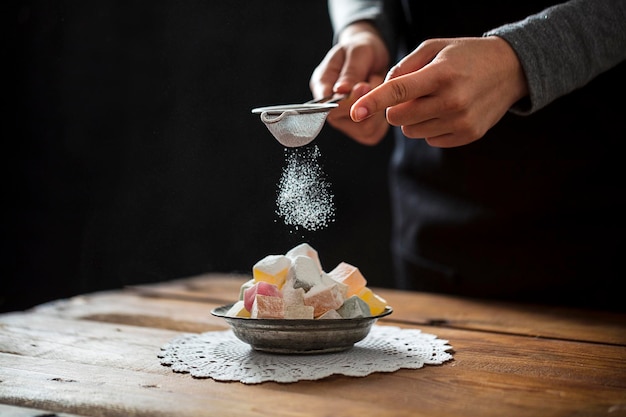 midsection of person preparing food on table