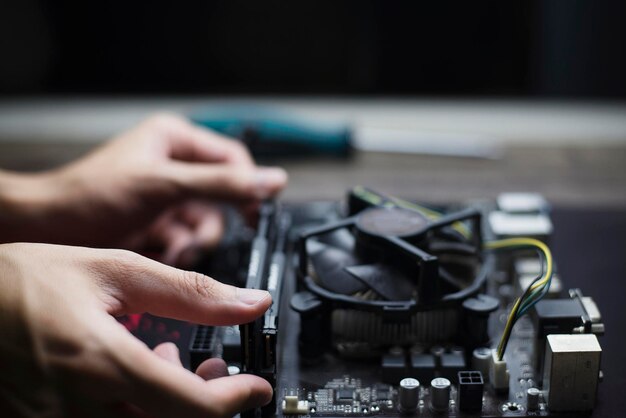 Photo midsection of person working on barbecue grill