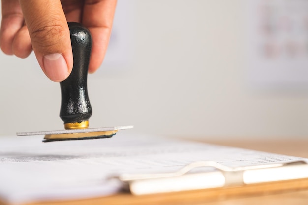 Photo midsection of person working on table