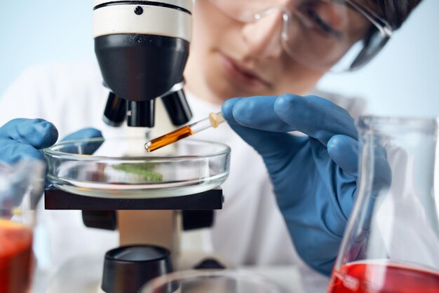 Photo midsection of scientist holding laboratory