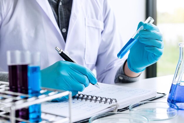 midsection of scientist working in laboratory