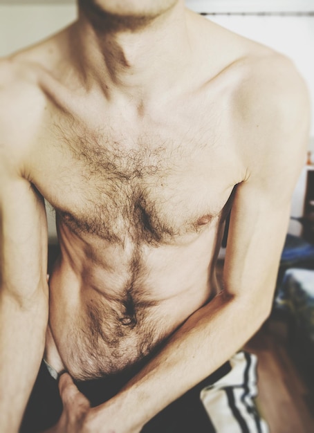 Photo midsection of shirtless man
