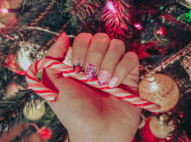 Photo midsection of woman holding christmas decorations