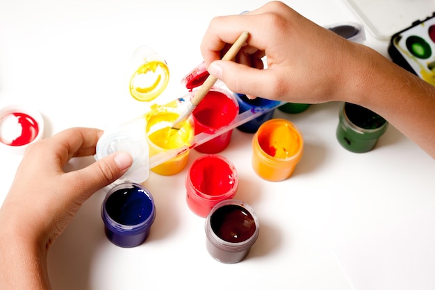 Midsection of woman holding colorful toys