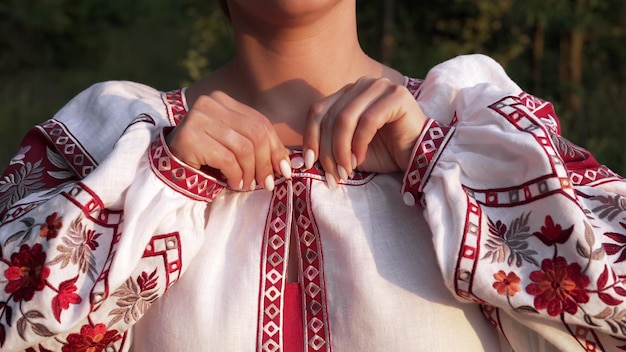 Midsection of woman holding dress