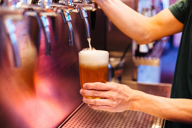 Midsection of woman holding drink