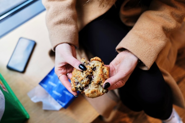 Midsection of woman holding food