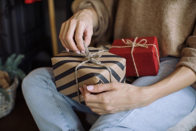 Photo midsection of woman holding gifts box