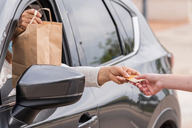 Photo midsection of woman holding hands on car