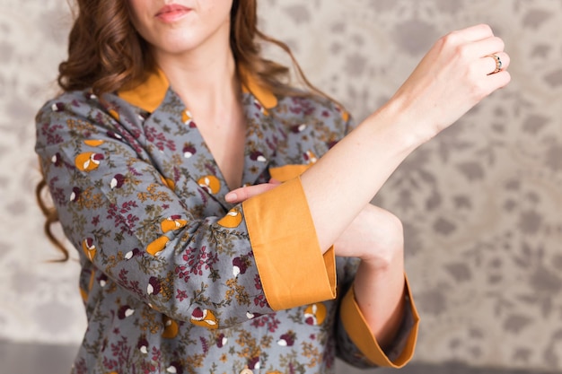 Midsection of woman holding hands