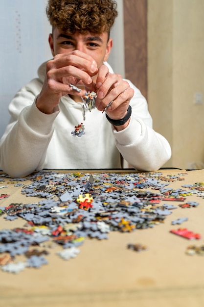 Midsection of woman holding jigsaw piece