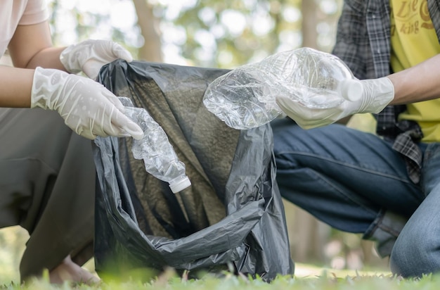 Midsection of woman holding plastic
