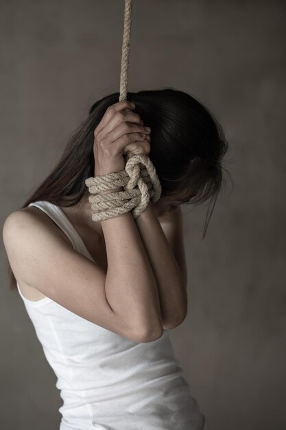 Photo midsection of woman holding rope