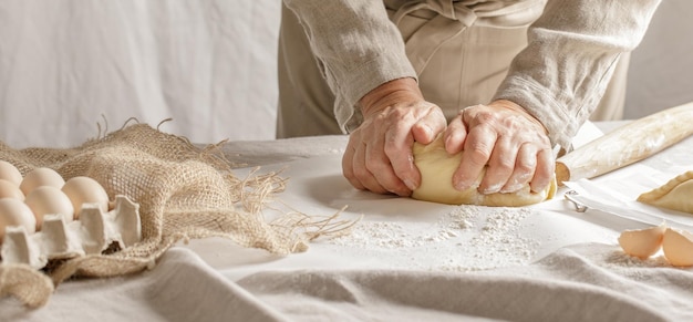 Midsection of woman holding seashell at home