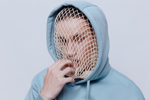 Photo midsection of woman holding tape measure against white background