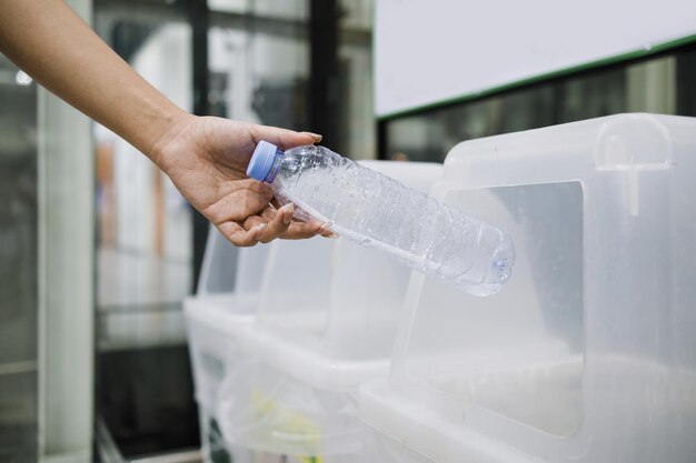 midsection of woman holding water