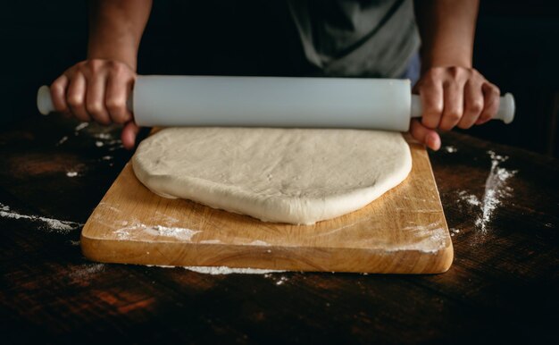 Midsection of woman preparing food on table