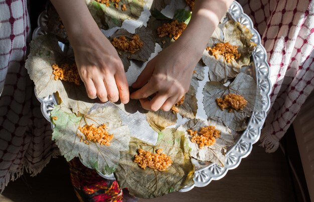 Midsection of woman preparing food