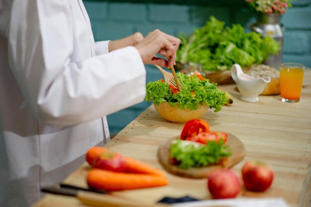 Photo midsection of woman preparing food