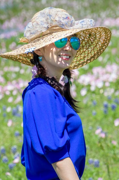 Midsection of woman wearing hat