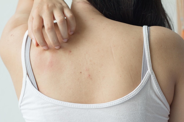 Midsection of woman wearing tank top