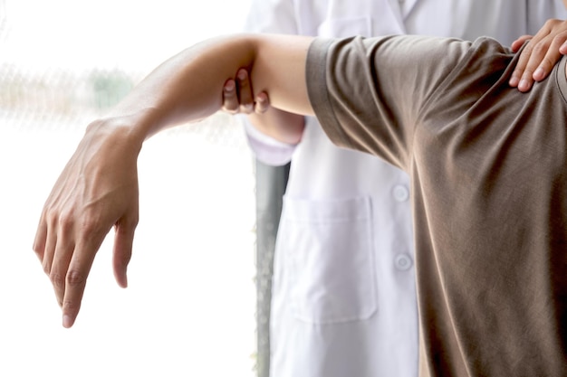 Photo midsection of woman with arms raised standing against white background