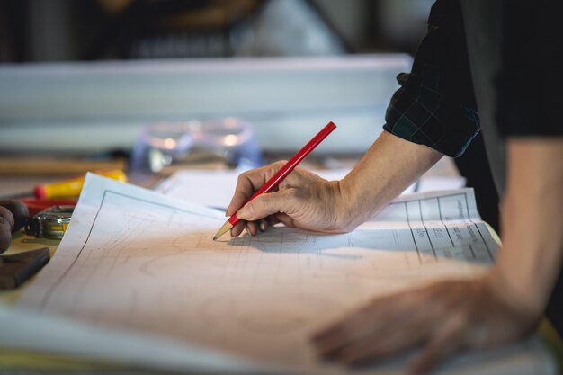 Photo midsection of woman working on table