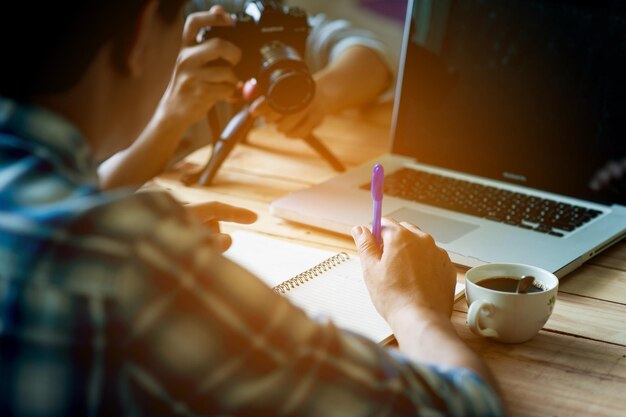 Photo midsection of woman working on table