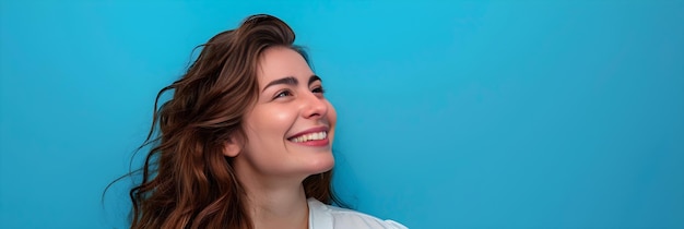 miling woman on blue background