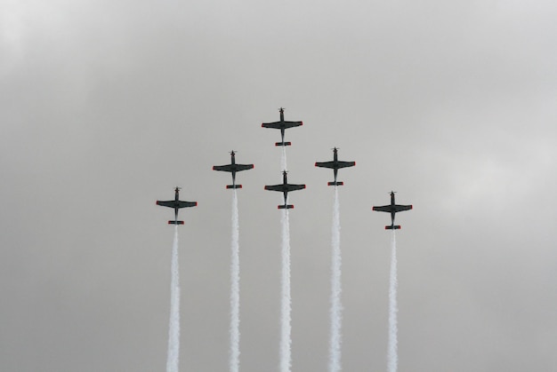 Military aircraft perform in the sky at an air show in Greece