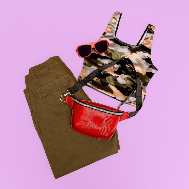 Military fashion flat lay look. Trendy accessories and clothing