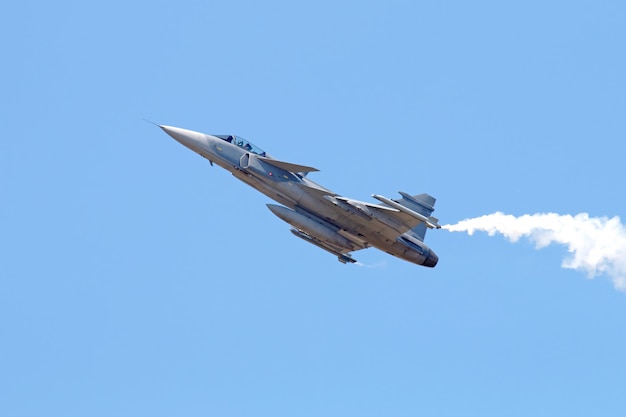 Military Fighter Jet on blue sky