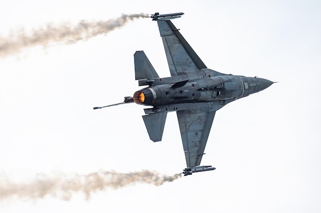 Military fighter jet plane at air base Airport and airfield Air force flight operation Aviation and aircraft Air defense Military industry Fly and flying Dogfight and afterburner