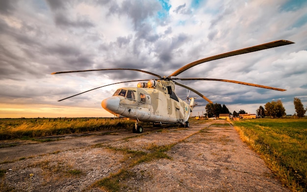 Military helicopter at beautiful sunset