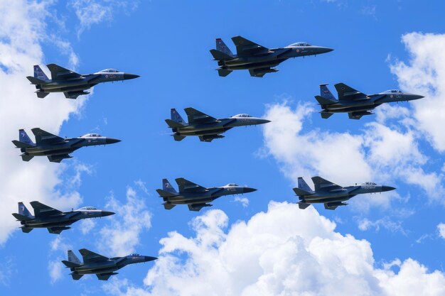 Photo military jets flying in blue sky for a memorial day