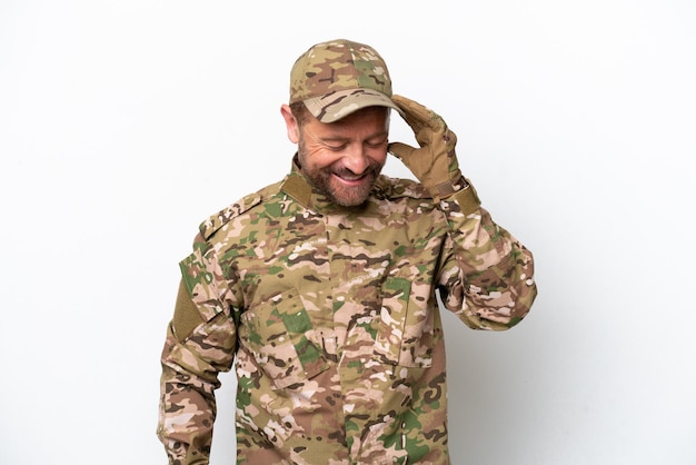 Military man isolated on white background laughing