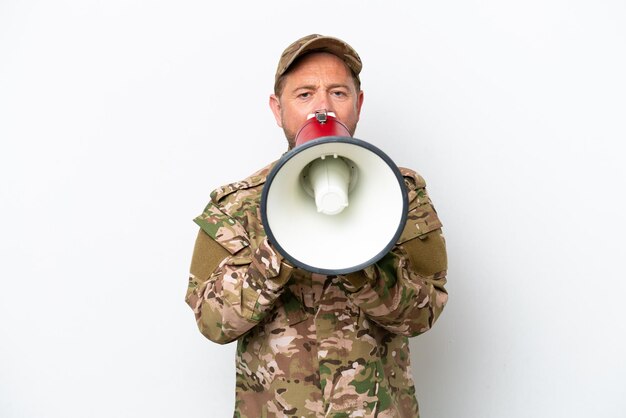 Military man isolated on white background shouting through a megaphone