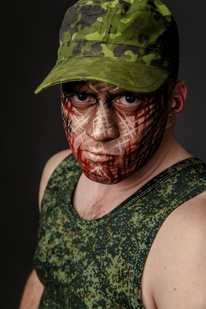 Military Style Camouflage on the Soldier's Face