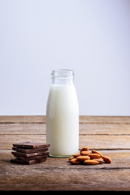 Milk in bottle, chocolate and almond 