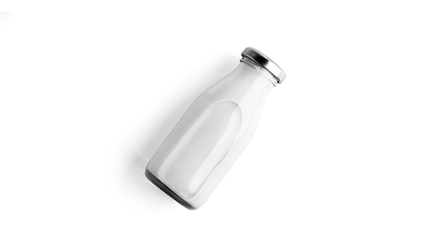 Photo milk bottle isolated on white.