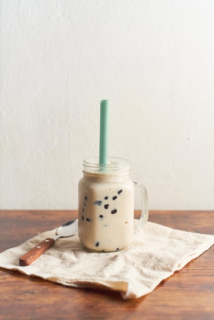 Milk bubble tea with tapioca pearls drink in glasses