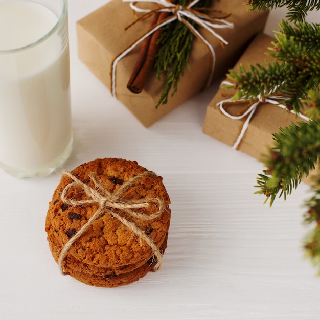 Milk and cookies for Santa Claus under the christmas tree