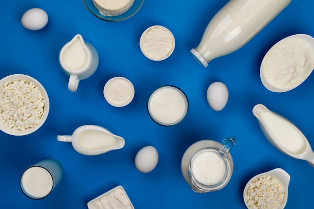 Milk, cottage cheese, sour cream and yogurt, top view, flat lay