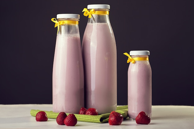 Milk and fruits. Yogurt from natural milk and strawberries