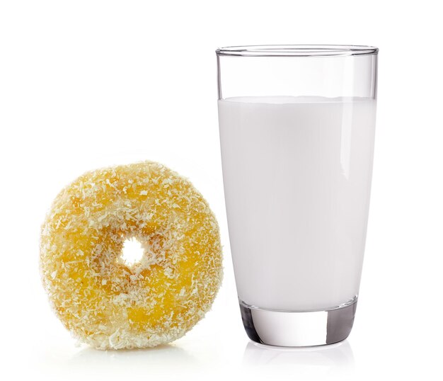 milk in the glass and donut on white background