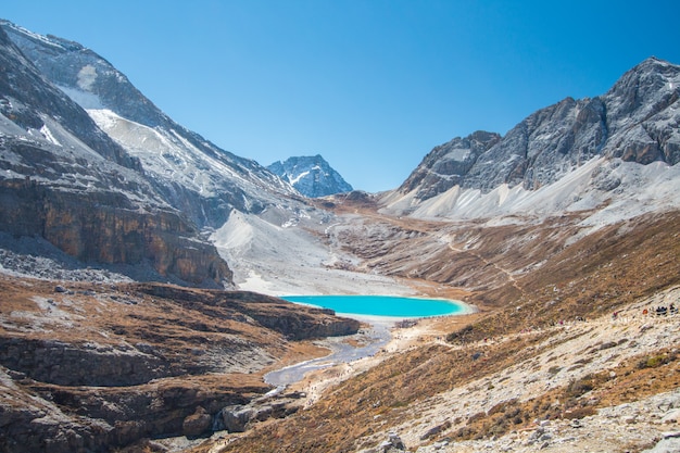 milk lake and snow mountain at yading national park,china