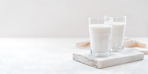 Milk on a light background with space to copy