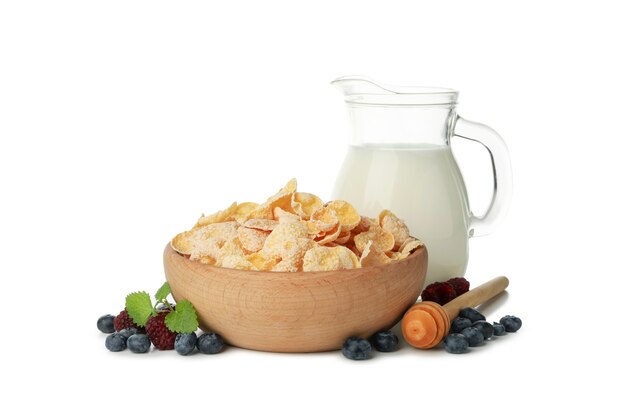 Milk, muesli, berry and dipper isolated