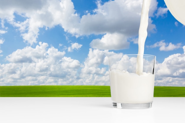 Milk on a table on blue sky